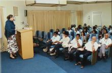 A speaker addresses an audience at IIT Madras