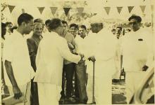 Warm greetings are exchanged on the occasion of the Central School building inauguration, 1965