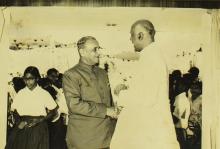 Dr. C. D. Deshmukh and Dr. Rajah Sir Muthiah Chettiar greet each other at the Central School’s entrance, 1965