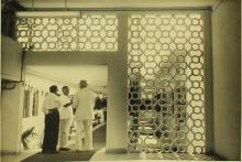 A snapshot of three gentlemen conversing at the inauguration of the Central School building at IIT Madras, 1965