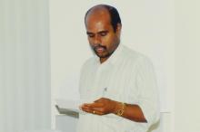 A speaker addresses a gathering, 2006