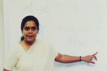 A speaker addresses a gathering at the 4th Hindi Workshop, 2006