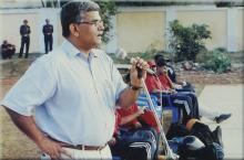 Prof. V. G. Idichandy addresses a gathering during a basketball tournament, 2005