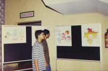 Students going through an exhibition, 1999