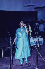 A singer performs a piece at Bharat Utsav, 1999