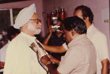 Dr. Manmohan Singh puts on the convocation robes, 1994