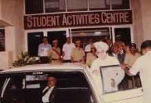 Dr. Manmohan Singh enters a car outside the Student Activities Centre, 1994
