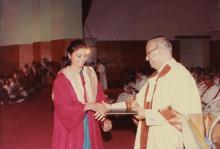 Prof. N. V. C. Swamy presents a degree to a graduand at the 27th Convocation, 1990