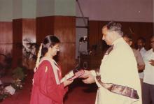 Mr. Arif Mohammed Khan presents a degree to a graduand at the 27th Convocation, 1990