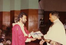 Mr. Arif Mohammed presents a degree to a graduand at the 27th Convocation, 1990