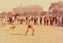 A track event being conducted at the 22nd Inter-IIT Sports Meet, 1985