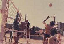 The IIT Madras volleyball team participates in a match, 1985