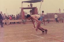 An IIT Madras athlete at a relay event, 1985