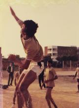 An IIT Madras volleyball player spikes the ball, 1985
