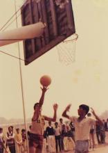 A basketballer takes a layup, 1985