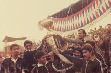 A victorious team hoists the General Championship at IIT Delhi, 1985