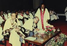 Dr. M. S. Swaminathan signs the record of degrees conferred at the 29th Convocation, 1992
