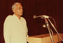 A speaker addresses the audience at an event at IIT Madras