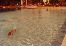 A photograph taken at a swimming pool