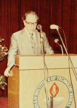 A speaker addresses the audience at an event at IIT Madras