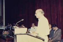 A speaker addresses an audience at IIT Madras, 1988