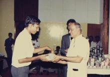 A student receives an award from Prof. L. S. Srinath, 1988