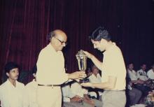 A trophy is presented to a person at the 29th Institute Day, 1988
