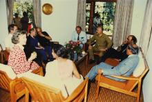 Visitors, guests, Chairman and Director in discussion, 1988