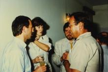Visitors and guests in conversation, 1988