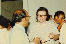 The Chairman interacts with a guest, 1988