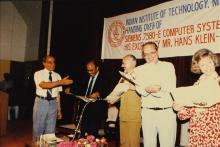 Sharing a lighter moment on stage, 1988