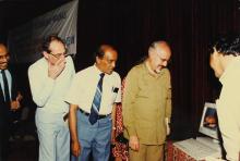 Brand new computer terminal being inspected, 1988