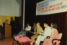 A speaker addresses the audience, 1988