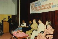 A speaker addresses the audience, 1988