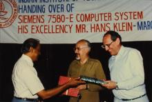 Director presents gifts to the distinguished German guests, 1988