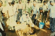 Dr. Konrad Seitz waters a sapling at IIT Madras, 1988