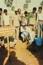Dr. Konrad Seitz waters a sapling at IIT Madras, 1988