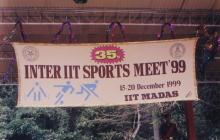 A banner hangs at the Manohar C. Watsa Stadium, 1999