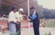 Lighting the torch, 1999