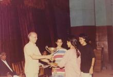 Prof. Y. Narayana Rao presents a trophy to three girls, 1994