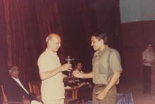 Prof. Y. Narayana Rao presents a trophy to a gentleman, 1994