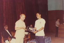 Prof. Y. Narayana Rao presents a shield to a student, 1994