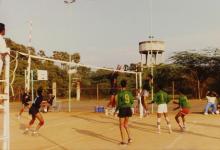 Students take part in a volleyball match, 1994