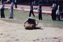 A student takes part in a jump event, 1999