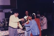 Prof. R. Natarajan presents a trophy to a student, 1999