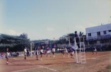 A photograph taken during a volleyball match, 1999
