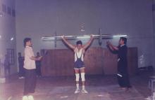A weightlifter in action, 1999