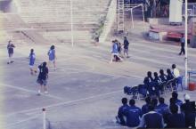 At a basketball match, 1999