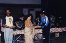 A student receives a prize, 1999