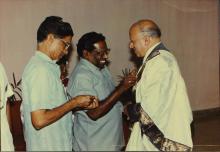 IIT Madras staff assist the Chairman, Board of Governors, Dr. M. S. Swaminathan in wearing his convocation robe, 1993
